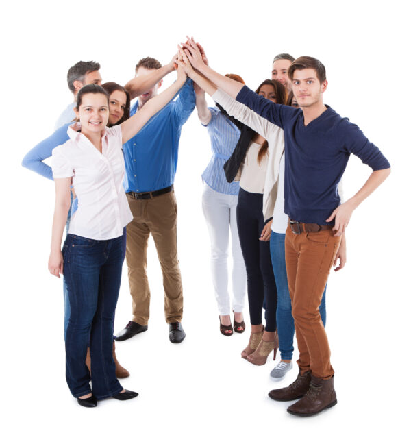 Diverse group of people making high five gesture